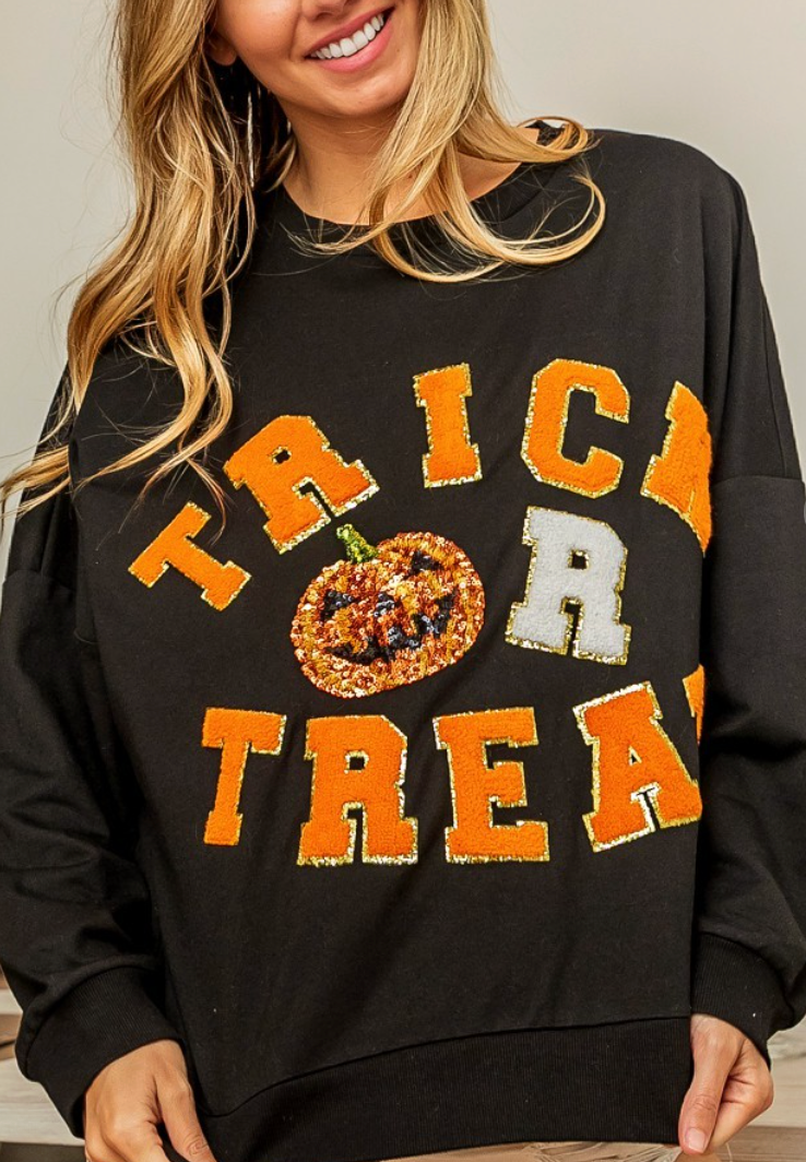 TRICK OR TREAT SWEATSHIRT